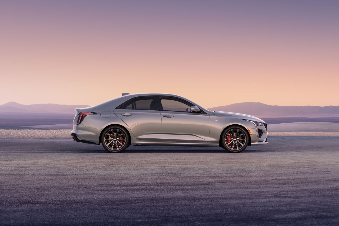 Side Profile View of a Silver 2026 CT4 Parked in the Open Desert