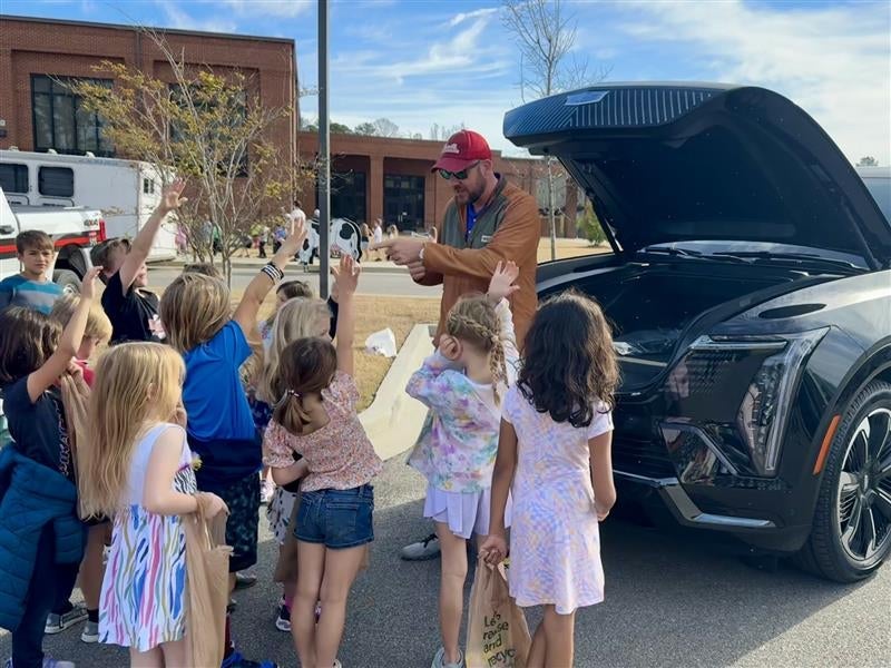 Students learning about electric vehicles at Frances Meeks Elementary